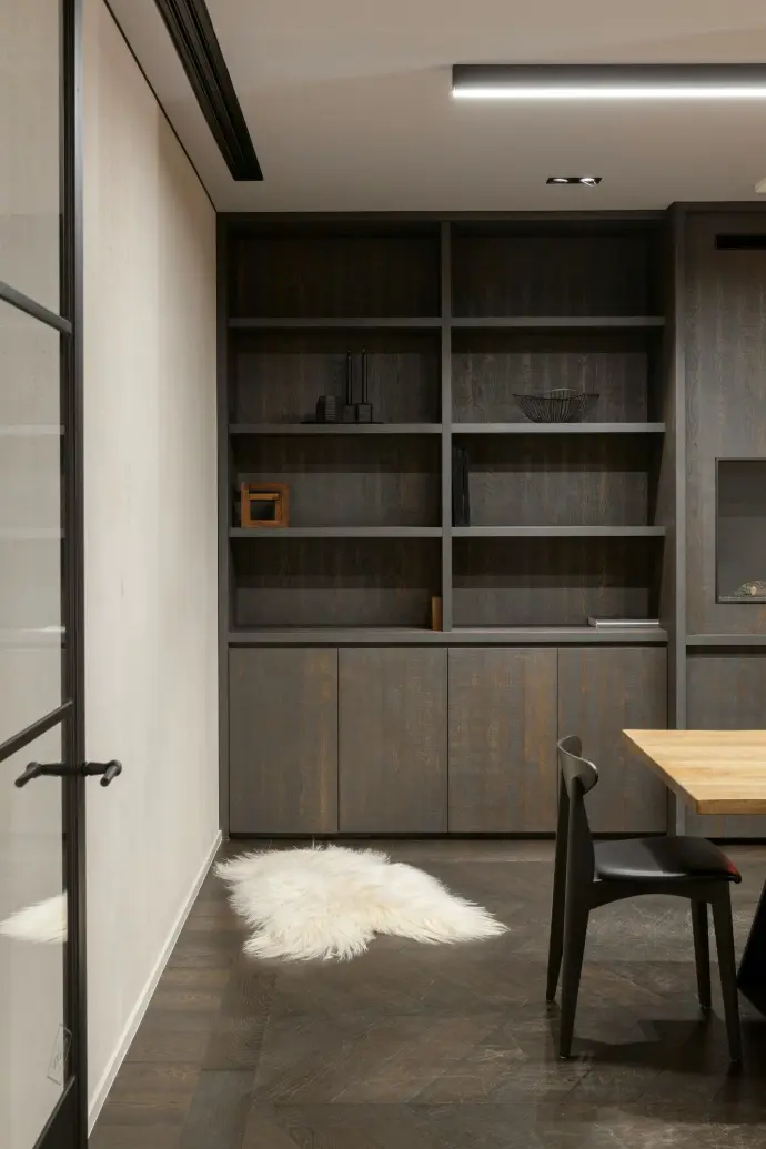 white fur textile on black chair